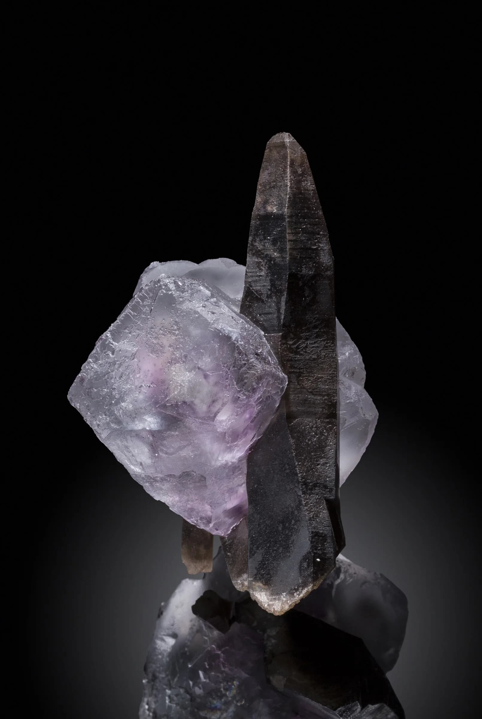 Fluorite with smoky quartz specimen presented as the central Showcase hero specimen.